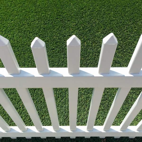 White vinyl picket fence