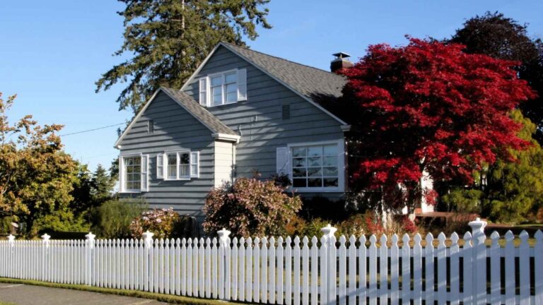White picket fence around residential property